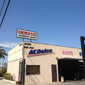 Okimoto's Automotive Center storefront and sign