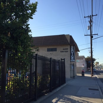 Side of the building with the Service sign